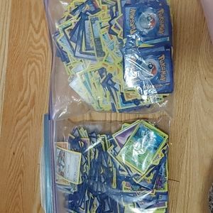 2 bags of genuine Pokemon cards approximately 200 cards